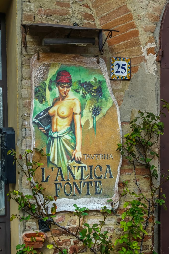Restaurant sign of L'Antica Fonte in Certaldo